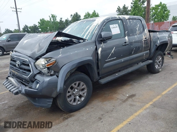 2017 Toyota Tacoma SR5 z VIN 3TMAZ5CN0HM039730, wystawiony jako IAAI lot #42406448 z przebiegiem 69 530 mil mil oraz . Historia ofert i sprzedaży dostępna na DreamBid. Obrazek 2.