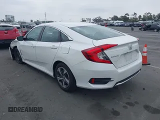 2020 Honda Civic LX z VIN 19XFC2F67LE212561, wystawiony jako IAAI lot #42272481 z przebiegiem 50 681 mil mil oraz . Historia ofert i sprzedaży dostępna na DreamBid. Obrazek 3.