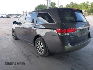2016 Honda Odyssey EX-L with VIN 5FNRL5H69GB043574, listed as a IAAI auction lot 42166972 with 116,240 mi miles and . Bid and sale history available at DreamBid. Image 3.