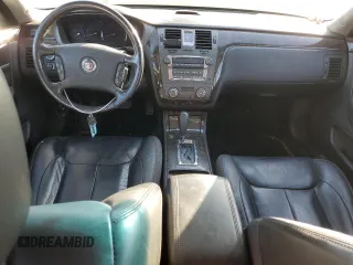 2009 Cadillac DTS 1SC z VIN 1G6KD57Y89U105190, wystawiony jako Copart lot #77560874 z przebiegiem 166 134 mil mil oraz Szkoda całkowita • Salvage title. Historia ofert i sprzedaży dostępna na DreamBid. Obrazek 8.