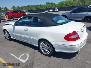 2009 Mercedes-Benz CLK-Class 3.5L with VIN WDBTK56F09T104434, listed as a IAAI auction lot 41976340 with 58,710 mi miles. Bid and sale history available at carsss.com. Image 3.