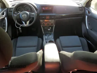 2013 Mazda CX-5 Sport with VIN JM3KE2BE7D0148951, listed as a Copart auction lot 57782115 with 65,677 mi miles and Salvage title. Bid and sale history available at DreamBid. Image 8.