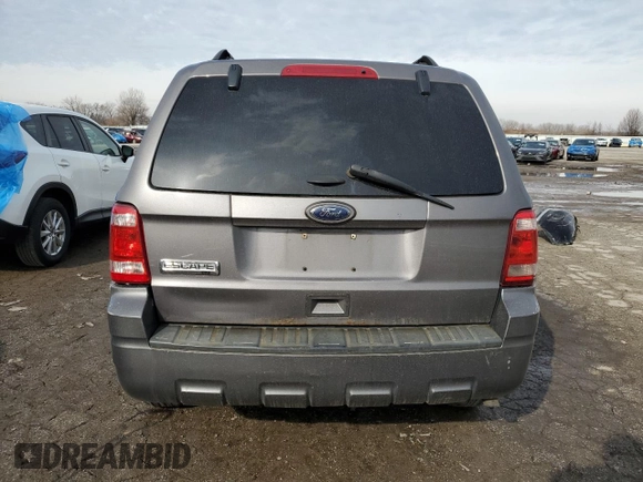 2012 Ford Escape XLT z VIN 1FMCU0D76CKB57447, wystawiony jako Copart lot #43465545 z przebiegiem 190 189 mil mil oraz Czysty tytuł • Clean title. Historia ofert i sprzedaży dostępna na DreamBid. Obrazek 6.