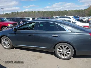 2013 Cadillac XTS Premium with VIN 2G61S5S33D9113653, listed as a IAAI auction lot 41837117 with 101,049 mi miles and . Bid and sale history available at DreamBid. Image 13.
