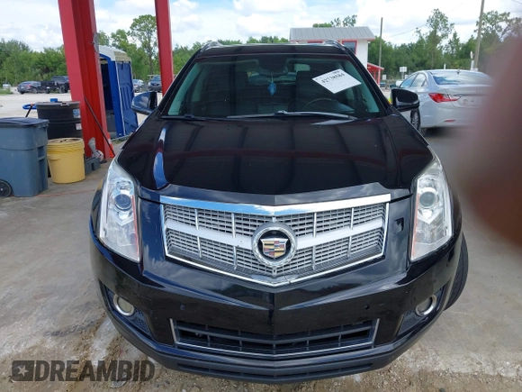 2012 Cadillac SRX Premium Collection z VIN 3GYFNCE36CS615725, wystawiony jako IAAI lot #42738584 z przebiegiem 156 625 mil mil oraz . Historia ofert i sprzedaży dostępna na DreamBid. Obrazek 6.