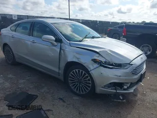 2018 Ford Fusion Titanium with VIN 3FA6P0D98JR155823, listed as a IAAI auction lot 42389958 with 126,949 mi miles and . Bid and sale history available at DreamBid. Image 1.