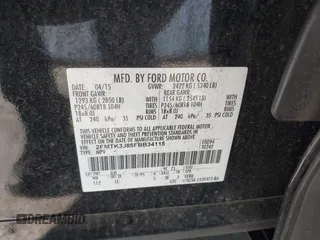 2015 Ford Edge SEL with VIN 2FMTK3J85FBB34115, listed as a IAAI auction lot 41813644 with 143,099 mi miles. Bid and sale history available at carsss.com. Image 9.