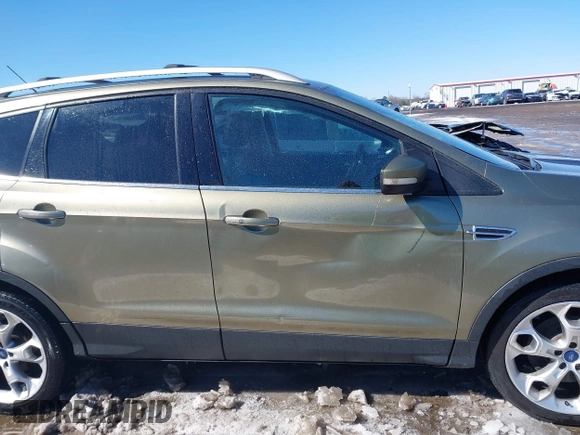2013 Ford Escape Titanium with VIN 1FMCU9J99DUD46870, listed as a IAAI auction lot 41614409 with 141,739 mi miles and . Bid and sale history available at DreamBid. Image 13.