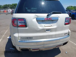2014 GMC Acadia Denali with VIN 1GKKVTKD1EJ220183, listed as a IAAI auction lot 42230611 with 103,789 mi miles and . Bid and sale history available at carsss.com. Image 6.