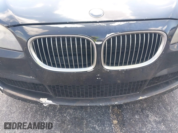 2012 BMW 7 Series 740i z VIN WBAKA4C50CDS99293, wystawiony jako IAAI lot #42208510 z przebiegiem 127 631 mil mil oraz . Historia ofert i sprzedaży dostępna na DreamBid. Obrazek 14.