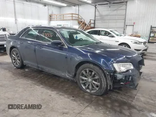 2016 Chrysler 300 Anniversary Edition with VIN 2C3CCARG4GH261572, listed as a IAAI auction lot 41411458 with 109,471 mi miles and . Bid and sale history available at DreamBid. Image 1.