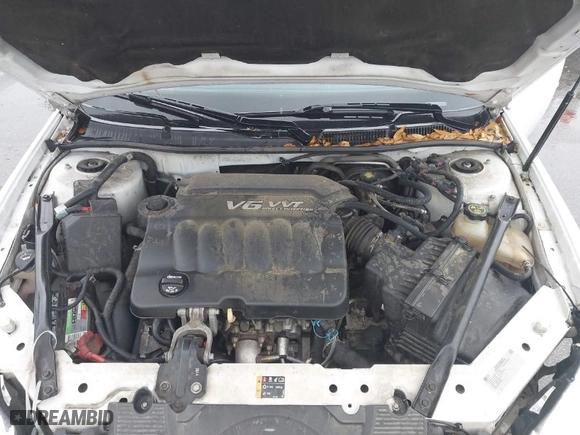 2015 Chevrolet Impala Limited LS with VIN 2G1WA5E34F1125046, listed as a IAAI auction lot 41972602 with 253,674 mi miles. Bid and sale history available at carsss.com. Image 10.