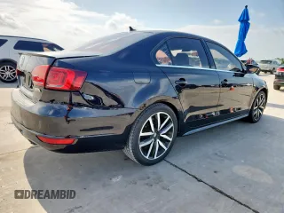 2014 Volkswagen Jetta GLI Edition 30 z VIN 3VW4S7AJ1EM390796, wystawiony jako Copart lot #61292085 z przebiegiem 138 224 mil mil oraz Czysty tytuł • Clean title. Historia ofert i sprzedaży dostępna na DreamBid. Obrazek 3.