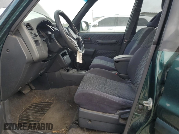2000 Toyota RAV4 with VIN JT3GP10V6Y7066183, listed as a Copart auction lot 53972305 with 213,886 mi miles and Clean title. Bid and sale history available at DreamBid. Image 7.