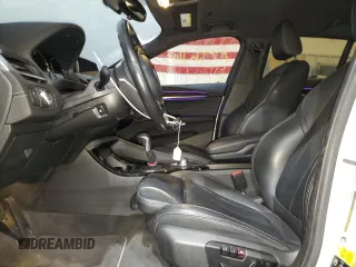 2018 BMW X2 xDrive28i with VIN WBXYJ5C38JEF75444, listed as a Copart auction lot 88367105 with 63,701 mi miles and Salvage Title. Bid and sale history available at carsss.com. Image 7.