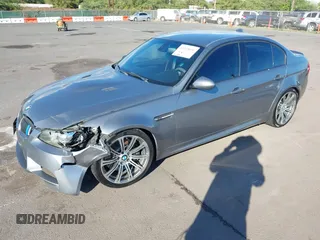 2010 BMW M3 with VIN WBSPM9C50AE202168, listed as a IAAI auction lot 41255651 with 142,845 mi miles. Bid and sale history available at carsss.com. Image 2.