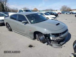 2019 Dodge Charger Scat Pack with VIN 2C3CDXGJ0KH614767, listed as a Copart auction lot 46982365 with 58,390 mi miles and Salvage title. Bid and sale history available at DreamBid. Image 4.