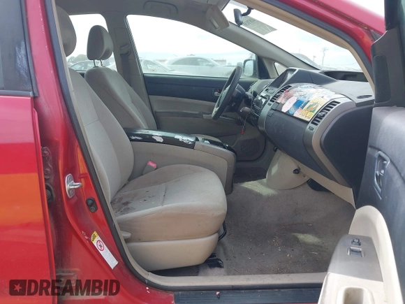 2007 Toyota Prius z VIN JTDKB20U877601207, wystawiony jako IAAI lot #41870158 z przebiegiem 218 955 mil mil oraz . Historia ofert i sprzedaży dostępna na DreamBid. Obrazek 5.
