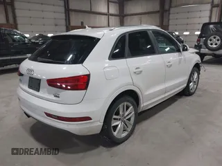 2017 Audi Q3 Premium z VIN WA1ECCFS0HR009385, wystawiony jako IAAI lot #42042437 z przebiegiem 110 341 mil mil oraz . Historia ofert i sprzedaży dostępna na DreamBid. Obrazek 4.
