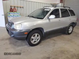 2003 Hyundai Santa Fe GLS z VIN KM8SC13DX3U431975, wystawiony jako Copart lot #56180275 z przebiegiem 239 295 mil mil oraz Czysty tytuł • Clean title. Historia ofert i sprzedaży dostępna na DreamBid. Obrazek 1.