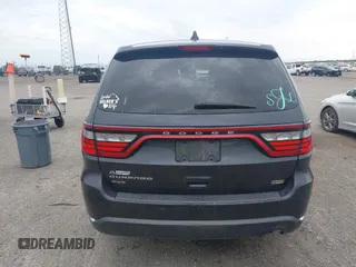 2014 Dodge Durango SXT with VIN 1C4RDJAG7EC307118, listed as a IAAI auction lot 42168781 with 92,977 mi miles and . Bid and sale history available at DreamBid. Image 16.