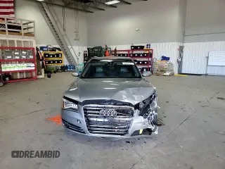2012 Audi A8 z VIN WAURVAFD3CN025035, wystawiony jako Copart lot #52252915 z przebiegiem 71 312 mil mil oraz Szkoda całkowita • Salvage title. Historia ofert i sprzedaży dostępna na DreamBid. Obrazek 11.
