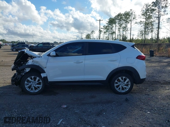 2019 Hyundai Tucson SE with VIN KM8J2CA48KU951829, listed as a IAAI auction lot 41261166 with 100,533 mi miles. Bid and sale history available at carsss.com. Image 14.