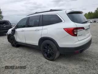 2021 Honda Pilot Special Edition with VIN 5FNYF6H29MB062742, listed as a Copart auction lot 54957435 with 66,915 mi miles and Salvage Title. Bid and sale history available at DreamBid. Image 2.