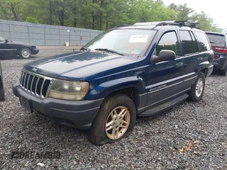 2003 Jeep Grand Cherokee Laredo z VIN 1J4GW48S73C553686, wystawiony jako IAAI lot #42278695 z przebiegiem 154 374 mil mil oraz . Historia ofert i sprzedaży dostępna na DreamBid. Obrazek 2.