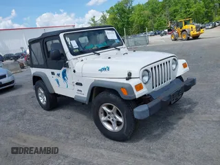 2003 Jeep Wrangler SE with VIN 1J4FA29143P367102, listed as a IAAI auction lot 42132752 with Not provided miles and . Bid and sale history available at DreamBid. Image 1.