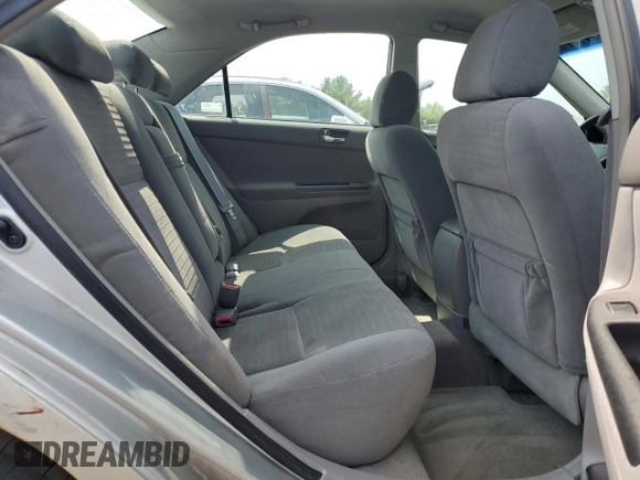 2006 Toyota Camry STD z VIN 4T1BE32K76U115783, wystawiony jako Copart lot #59911675 z przebiegiem 99 981 mil mil oraz Szkoda całkowita • Salvage title. Historia ofert i sprzedaży dostępna na DreamBid. Obrazek 10.