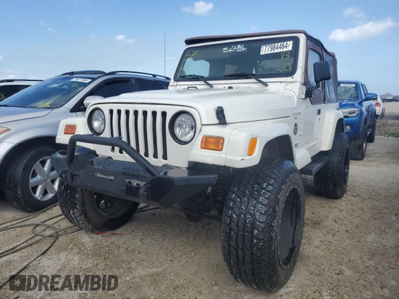 2001 Jeep Wrangler Sahara with VIN 1J4FA59S31P334308, listed as a Copart auction lot 77984464 with 116,293 mi miles and Salvage Title. Bid and sale history available at carsss.com. Image 1.