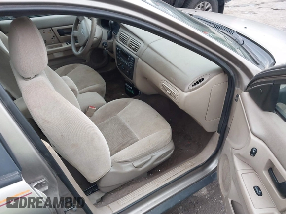 2005 Ford Taurus SE with VIN 1FAFP53215A127489, listed as a IAAI auction lot 40940239 with 127,180 mi miles. Bid and sale history available at carsss.com. Image 5.