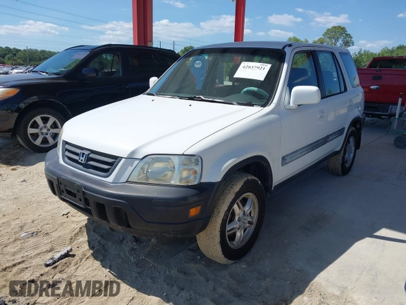 1999 Honda CR-V EX with VIN JHLRD1860XC037846, listed as a IAAI auction lot 42037921 with 164,477 mi miles. Bid and sale history available at carsss.com. Image 2.