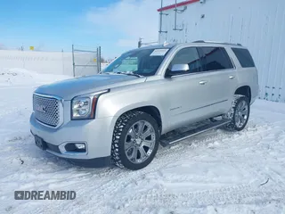 2016 GMC Yukon Denali with VIN 1GKS2CKJ7GR151020, listed as a IAAI auction lot 41539216 with 120,893 mi miles. Bid and sale history available at carsss.com. Image 2.