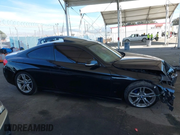 2014 BMW 4 Series 428i with VIN WBA3N7C51EK220125, listed as a IAAI auction lot 41881928 with 129,810 mi miles and . Bid and sale history available at carsss.com. Image 14.