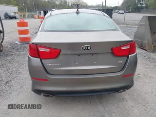 2014 Kia Optima LX with VIN 5XXGM4A73EG277964, listed as a IAAI auction lot 42079663 with 91,009 mi miles. Bid and sale history available at carsss.com. Image 17.