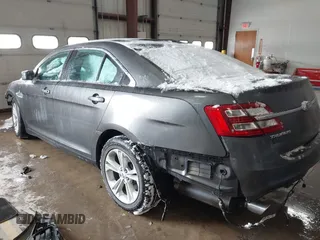 2015 Ford Taurus SEL with VIN 1FAHP2E89FG202589, listed as a IAAI auction lot 41592298 with 105,410 mi miles and . Bid and sale history available at carsss.com. Image 3.