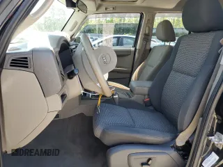 2009 Jeep Commander Sport z VIN 1J8HG48K99C551852, wystawiony jako Copart lot #55077775 z przebiegiem 157 829 mil mil oraz Szkoda całkowita • Salvage title. Historia ofert i sprzedaży dostępna na DreamBid. Obrazek 7.
