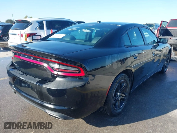 2020 Dodge Charger SXT with VIN 2C3CDXBG1LH123864, listed as a IAAI auction lot 41984310 with 117,828 mi miles and . Bid and sale history available at carsss.com. Image 4.