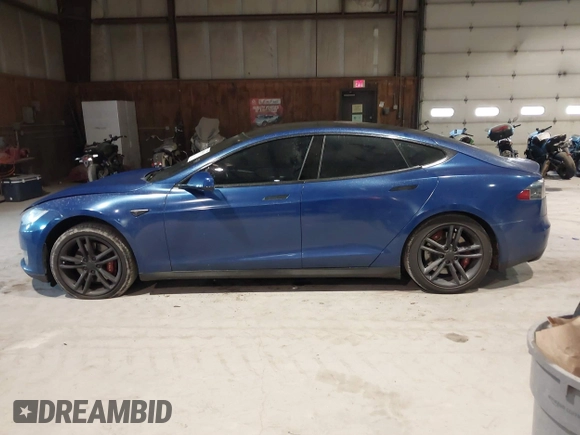 2014 Tesla Model S 60 with VIN 5YJSA1H1XEFP30497, listed as a IAAI auction lot 41294630 with 203,663 mi miles and . Bid and sale history available at DreamBid. Image 14.