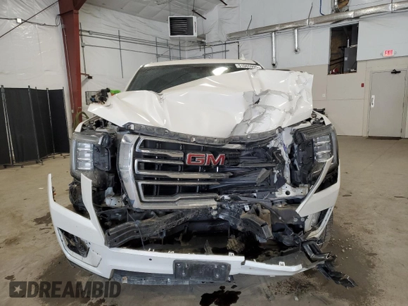 2022 GMC Yukon SLT with VIN 1GKS2BKD6NR106829, listed as a Copart auction lot 51065995 with 69,409 mi miles and Salvage Title. Bid and sale history available at carsss.com. Image 5.