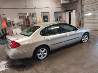 2001 Ford Taurus SES with VIN 1FAFP55S31A143202, listed as a IAAI auction lot 41950702 with 238,193 mi miles. Bid and sale history available at carsss.com. Image 4.