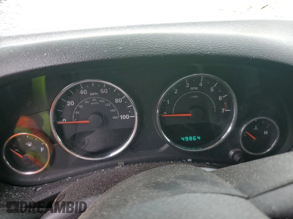 2012 Jeep Wrangler Sport with VIN 1C4AJWAG2CL233722, listed as a Copart auction lot 61125095 with 49,864 mi miles and Salvage title. Bid and sale history available at DreamBid. Image 9.