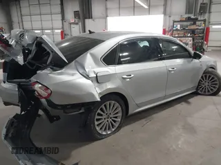 2016 Volkswagen Passat SE z VIN 1VWBT7A37GC027073, wystawiony jako IAAI lot #41073634 z przebiegiem 72 563 mil mil oraz . Historia ofert i sprzedaży dostępna na DreamBid. Obrazek 4.