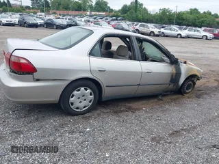 1999 Honda Accord LX with VIN 1HGCG6659XA113823, listed as a IAAI auction lot 42462228 with Not provided miles and . Bid and sale history available at DreamBid. Image 4.