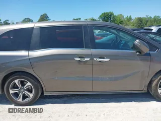 2020 Honda Odyssey Touring with VIN 5FNRL6H87LB002202, listed as a IAAI auction lot 42015741 with 182,051 mi miles and . Bid and sale history available at DreamBid. Image 13.