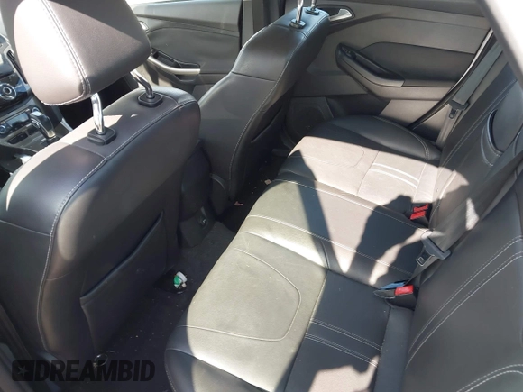 2012 Ford Focus SEL with VIN 1FAHP3H29CL151658, listed as a IAAI auction lot 42060139 with 149,547 mi miles and . Bid and sale history available at carsss.com. Image 8.