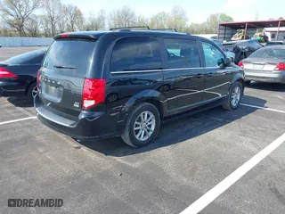 2019 Dodge Grand Caravan SXT with VIN 2C4RDGCGXKR594862, listed as a IAAI auction lot 41941792 with 95,982 mi miles. Bid and sale history available at carsss.com. Image 4.