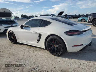 2017 Porsche Cayman S с VIN WP0AB2A83HS285419, выставлен на аукционе Copart как лот 73873894 с пробегом Не указан миль и Списание • Salvage title. История ставок и продаж доступна на DreamBid. Изображение 2.